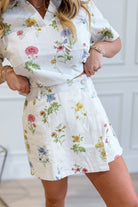 ENTRO Sadie floral printed wrap skirt with vibrant floral pattern and flowing fabric, perfect for casual or dressy outfits.