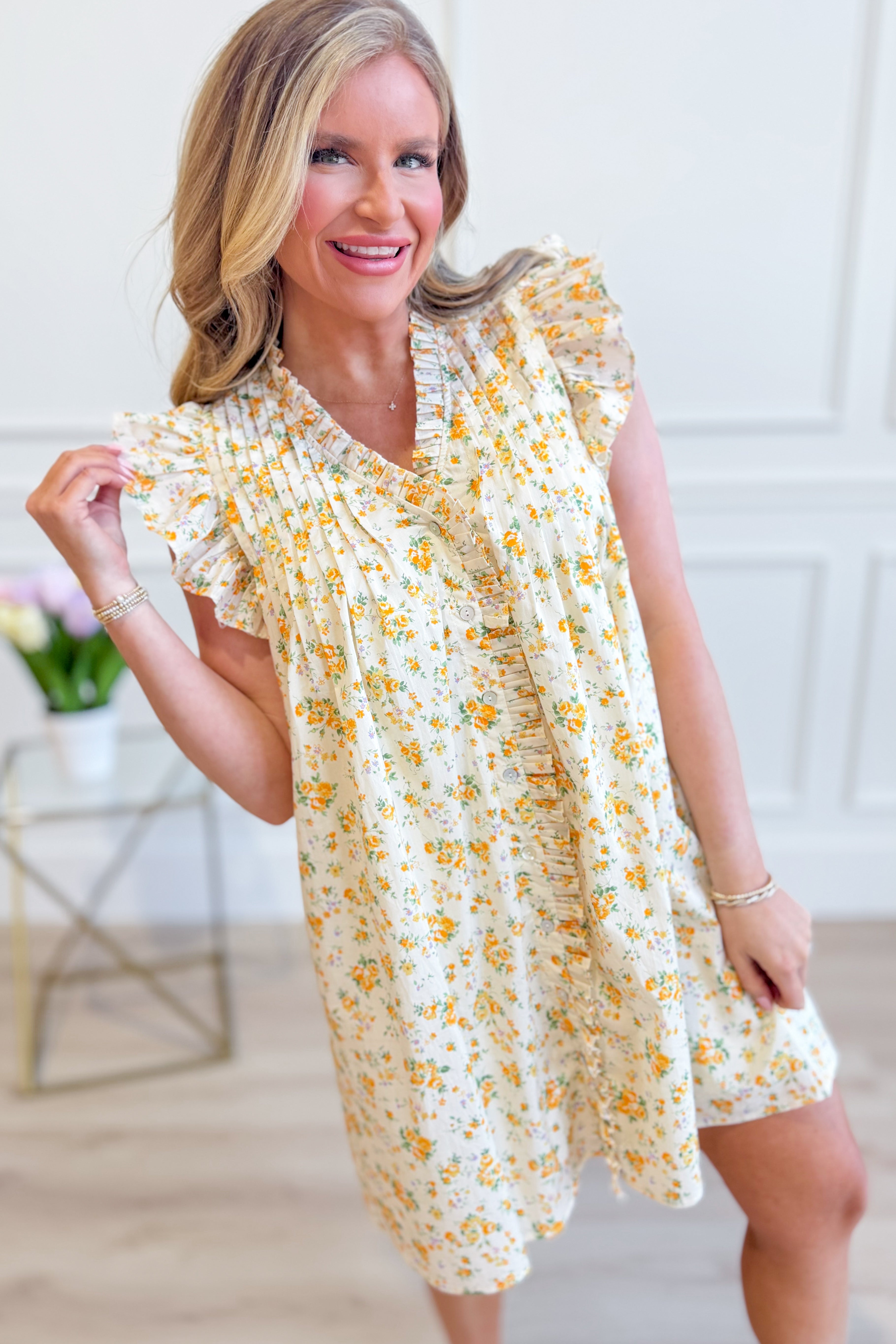 Mindy floral flutter sleeve dress by entro, elegant 125 dressy dress with colorful floral pattern and flowing flutter sleeves.