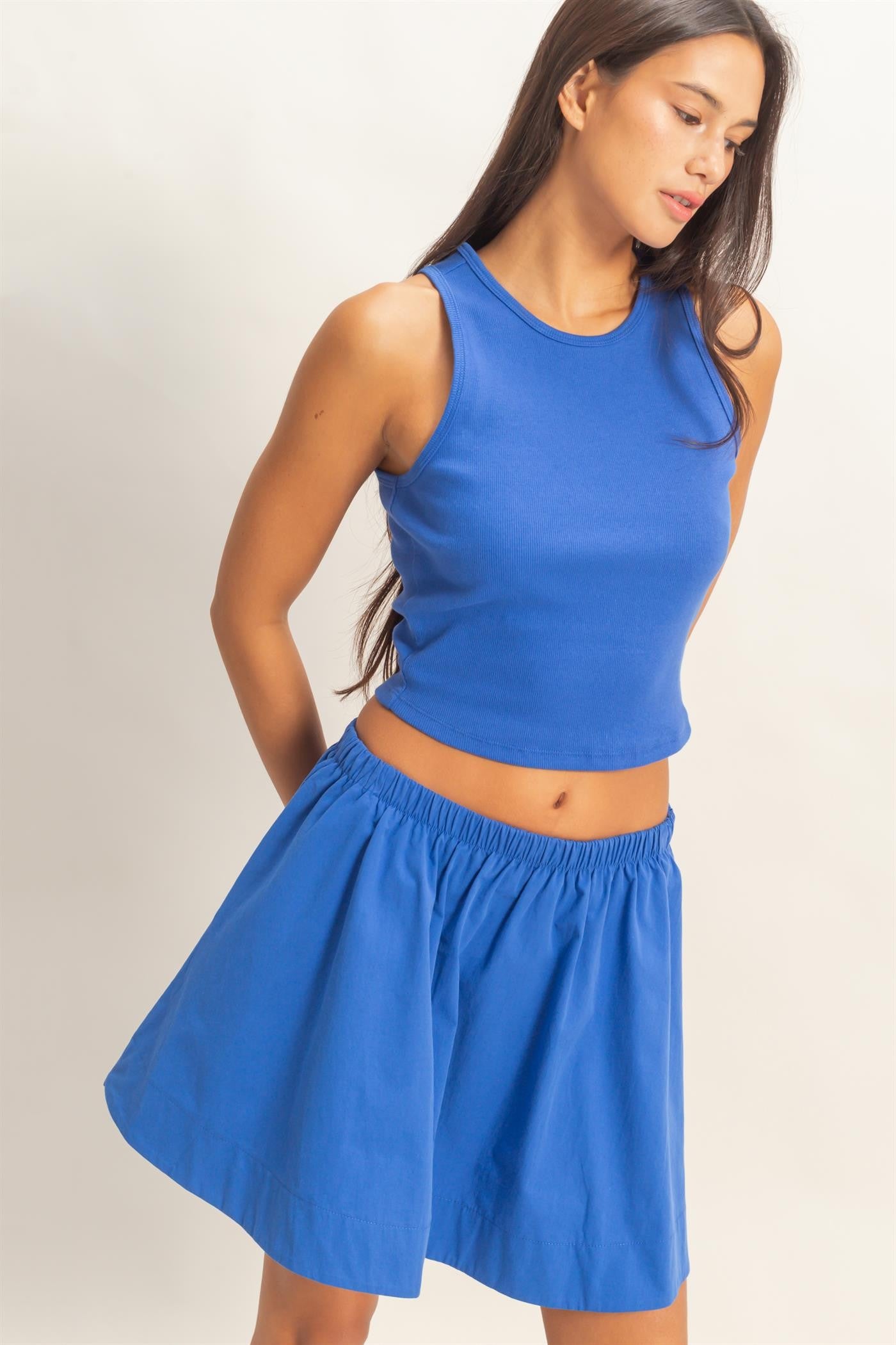 HYFVE Carter cobalt sleeveless ribbed skirt set featuring a fitted crop top and matching high-waisted skirt.