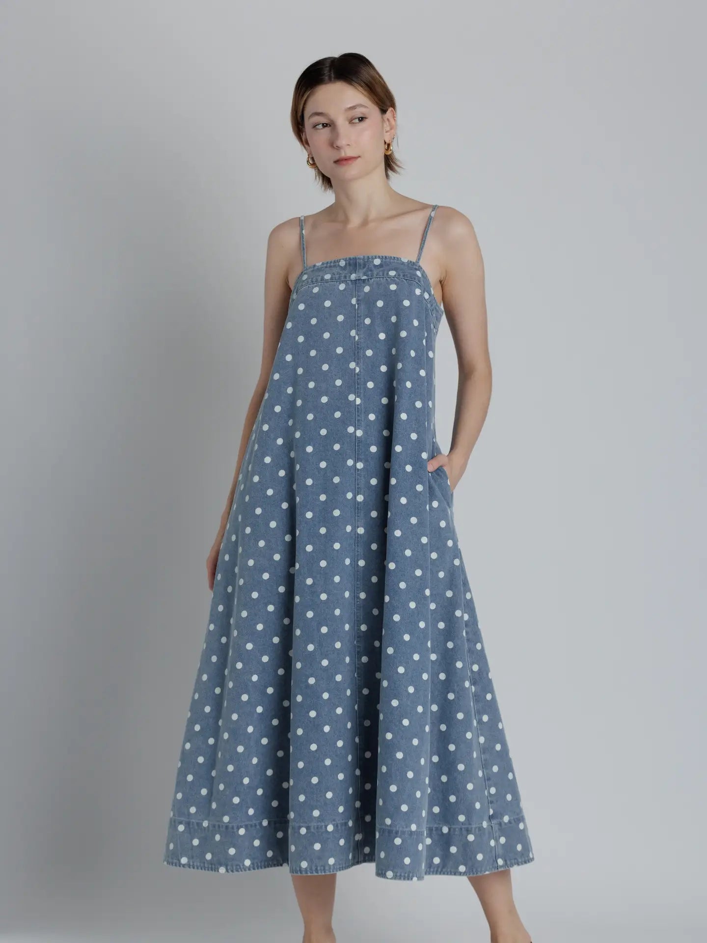 Aureum Mia Polka Dot Denim Dress, stylish 125 dressy dress with a fitted bodice, polka dot pattern, and sleeveless design.