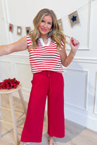 Red striped Nikki split neck top by STACCATO from the 131 Spring Sweaters collection, featuring a stylish split neckline and long sleeves.