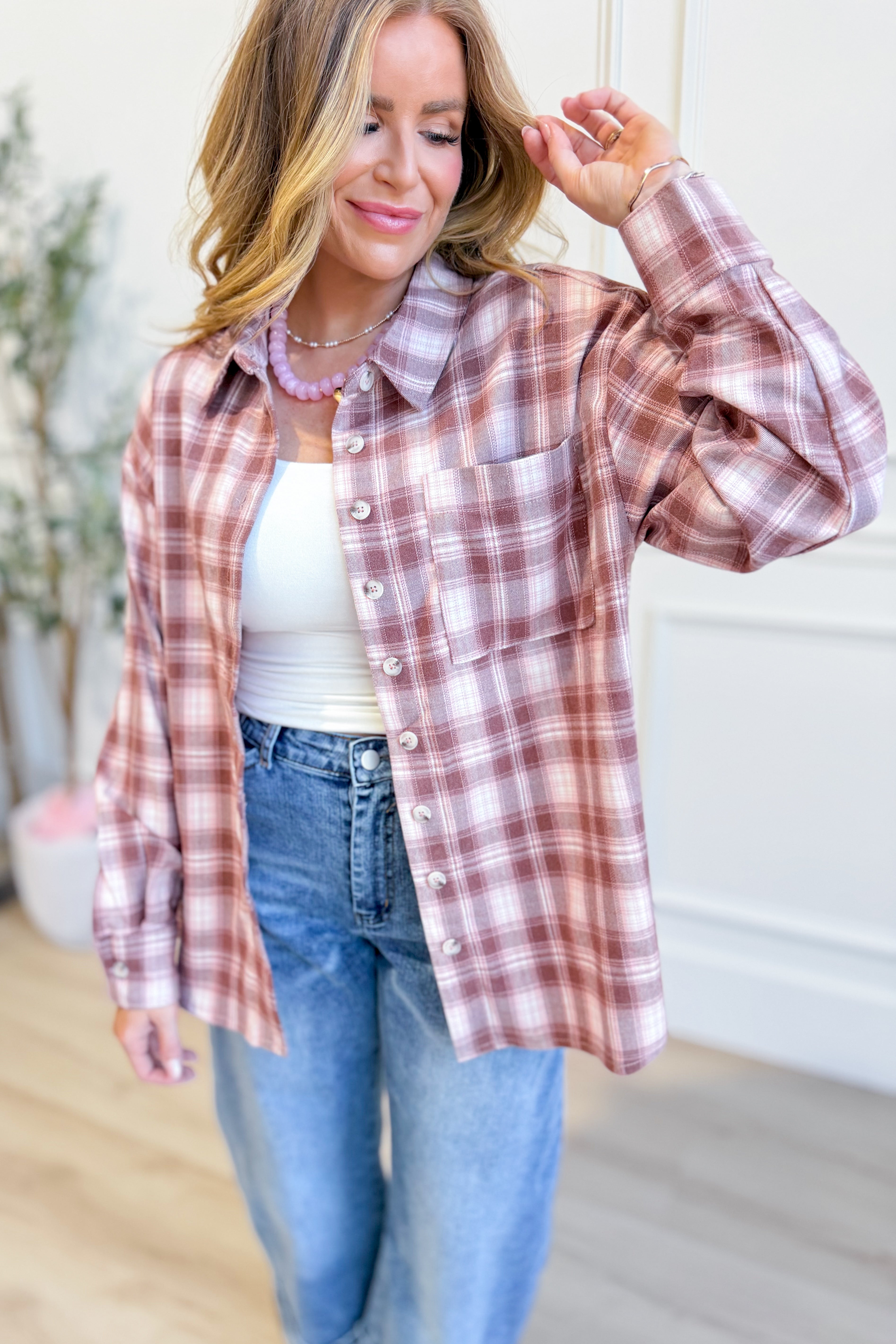 Wishlist Kyle pink oversized flannel top, a 105 casual women’s shirt with a relaxed fit, featuring a soft pink plaid pattern.