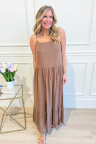 WISHLIST Wilma flowy maxi dress in soft fabric with elegant drape, sleeveless design, and high neckline for a dressy look.
