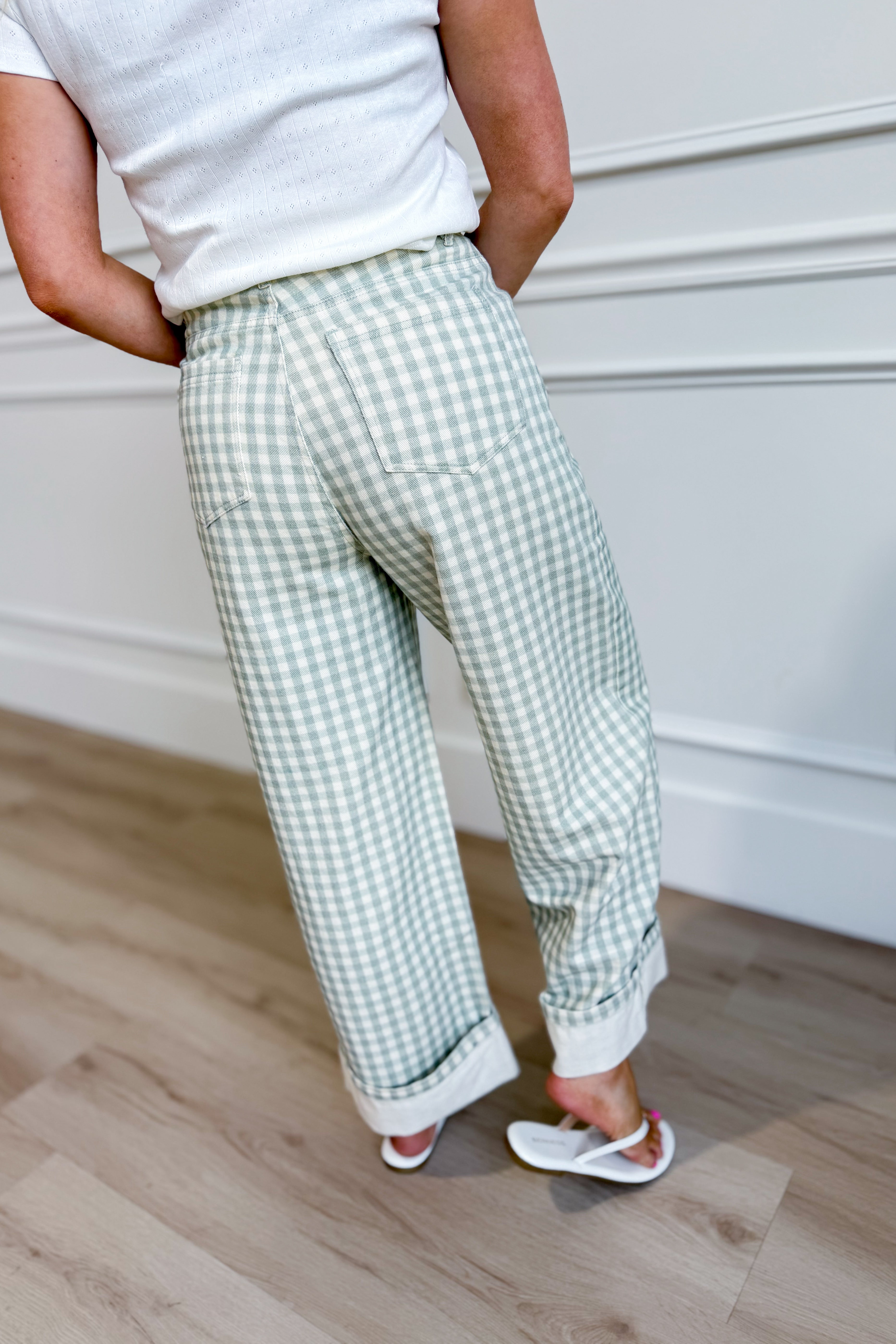 Luis Sage Gingham Rolled Hem Barrel Pant from PEACH LOVE, 147 Novelty Jeans, showing sage green gingham fabric with rolled hem detail.