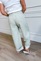 Luis Sage Gingham Rolled Hem Barrel Pant from PEACH LOVE, 147 Novelty Jeans, showing sage green gingham fabric with rolled hem detail.