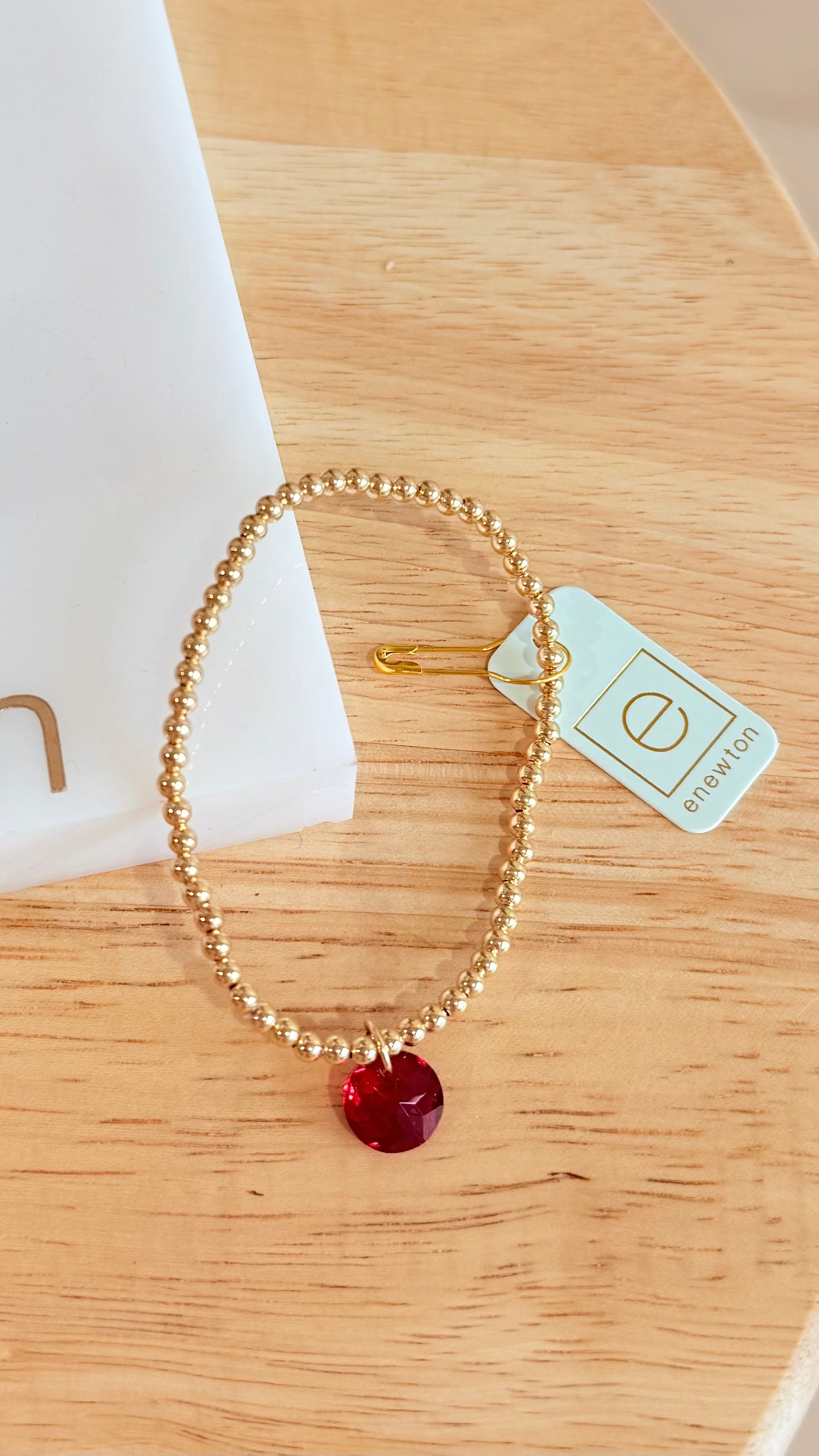 Enewton 3mm classic birthstone bracelet with colorful gemstones, delicate jewelry piece featuring a silver chain and round stones.
