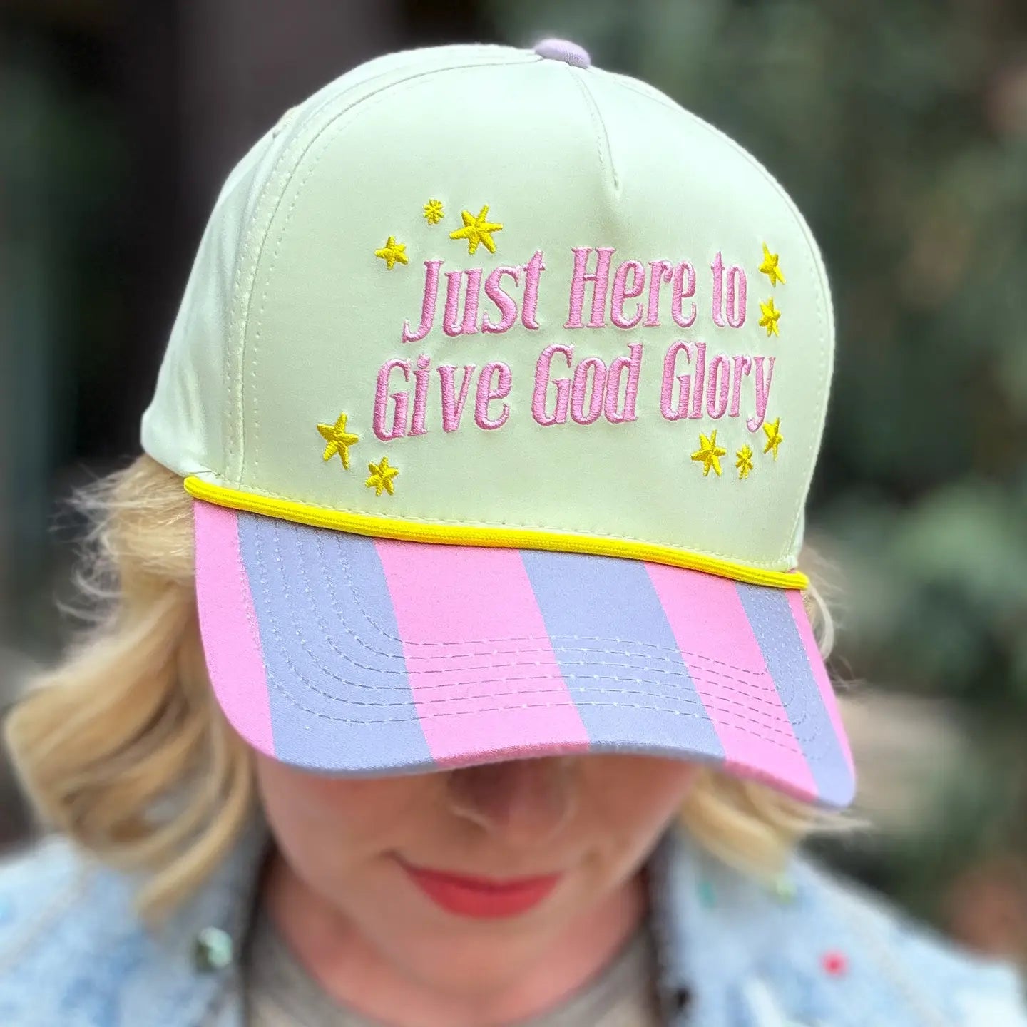 Give God Glory baseball hat by TAYLOR ELLIOT DESIGNS featuring embroidered text, positioned on a head mannequin.