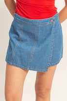 HYFVE Amy Wrap Front Denim Skirt, light blue, high-waisted with wrap detail, styled with casual top and accessories.