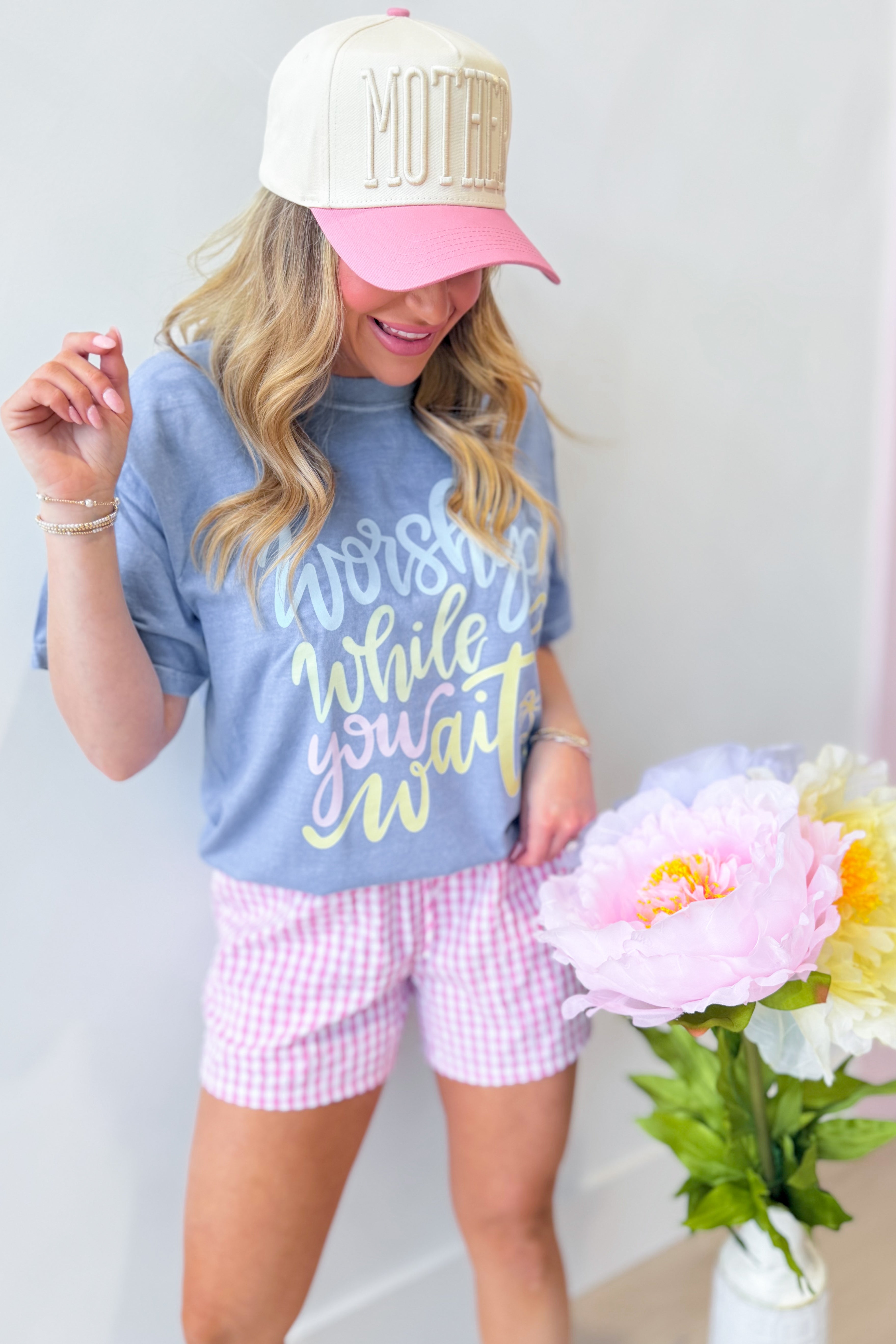 DASH FORWARD Worship While You Wait Graphic T-Shirt featuring bold text design on a casual cotton tee.