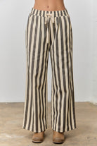 Baevely Kimmy Cream striped drawstring pants with relaxed fit and elastic waistband, featuring vertical stripe pattern.