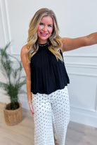 &MERCI sleeveless pointelle sweater knit tank top, a stylish dressy top with a delicate open-knit pattern.