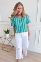ENTRO Connie striped scallop trim casual top with short sleeves and relaxed fit, featuring colorful horizontal stripes and scalloped neckline.