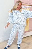 Frederick Grey Polka Dot French Terry Track Pant by PEACH LOVE, showing comfortable grey fabric with black polka dots and elastic waistband.