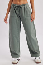 WISHLIST Vicki Olive Drawstring Barrel Pant from 147 Novelty Jeans, featuring a relaxed fit and olive green fabric.