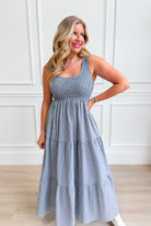 Baevely painter gingham midi dress with a stylish, flowy silhouette and classic black and white checkered pattern.