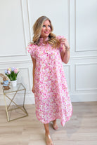 ENTRO Aubrey pink floral flutter sleeve dress with a flowy design, perfect for dressy occasions and elegant summer events.