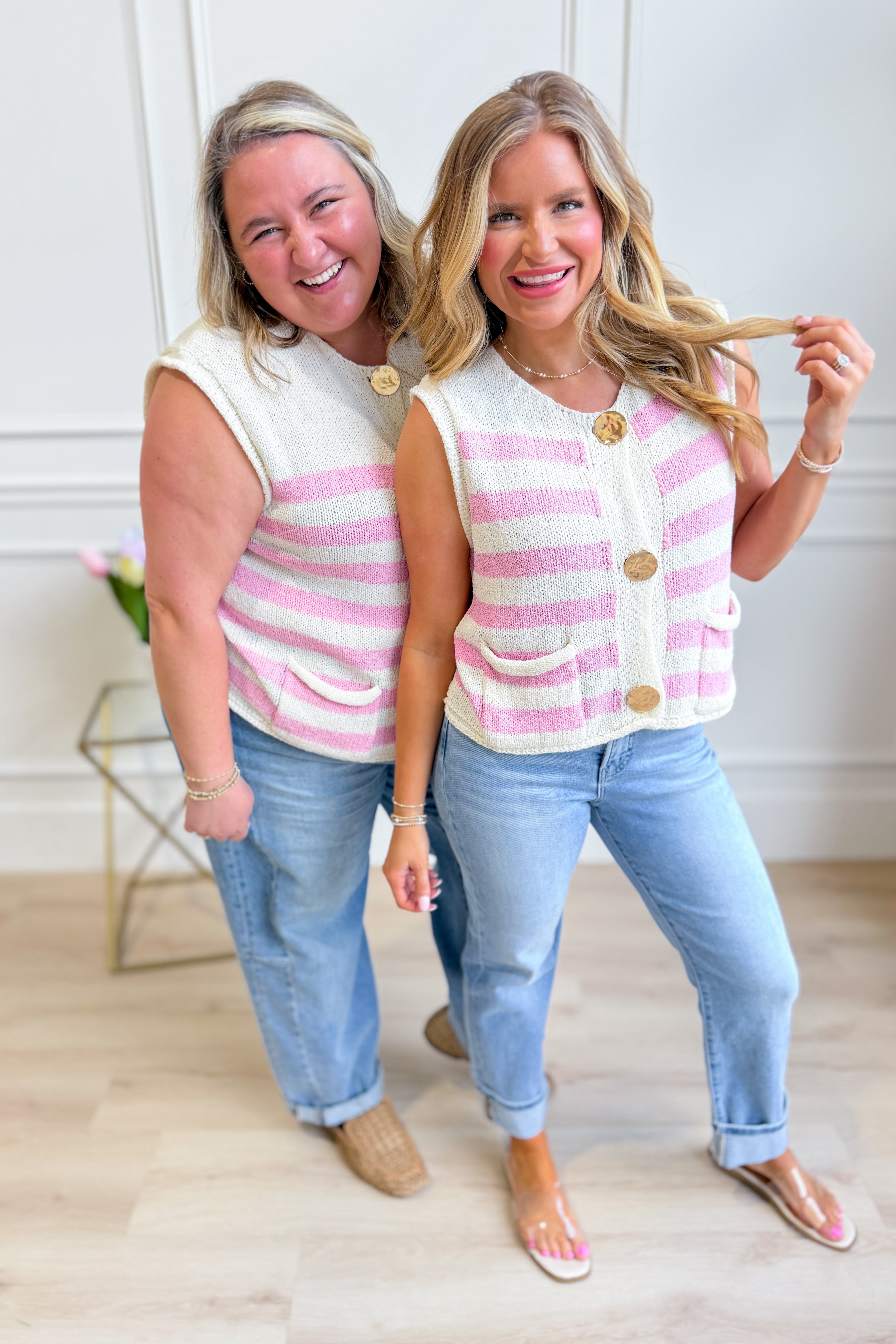 Carrie striped sleeveless sweater top by SHE + SKY, featuring a light, spring-ready knit with colorful horizontal stripes.