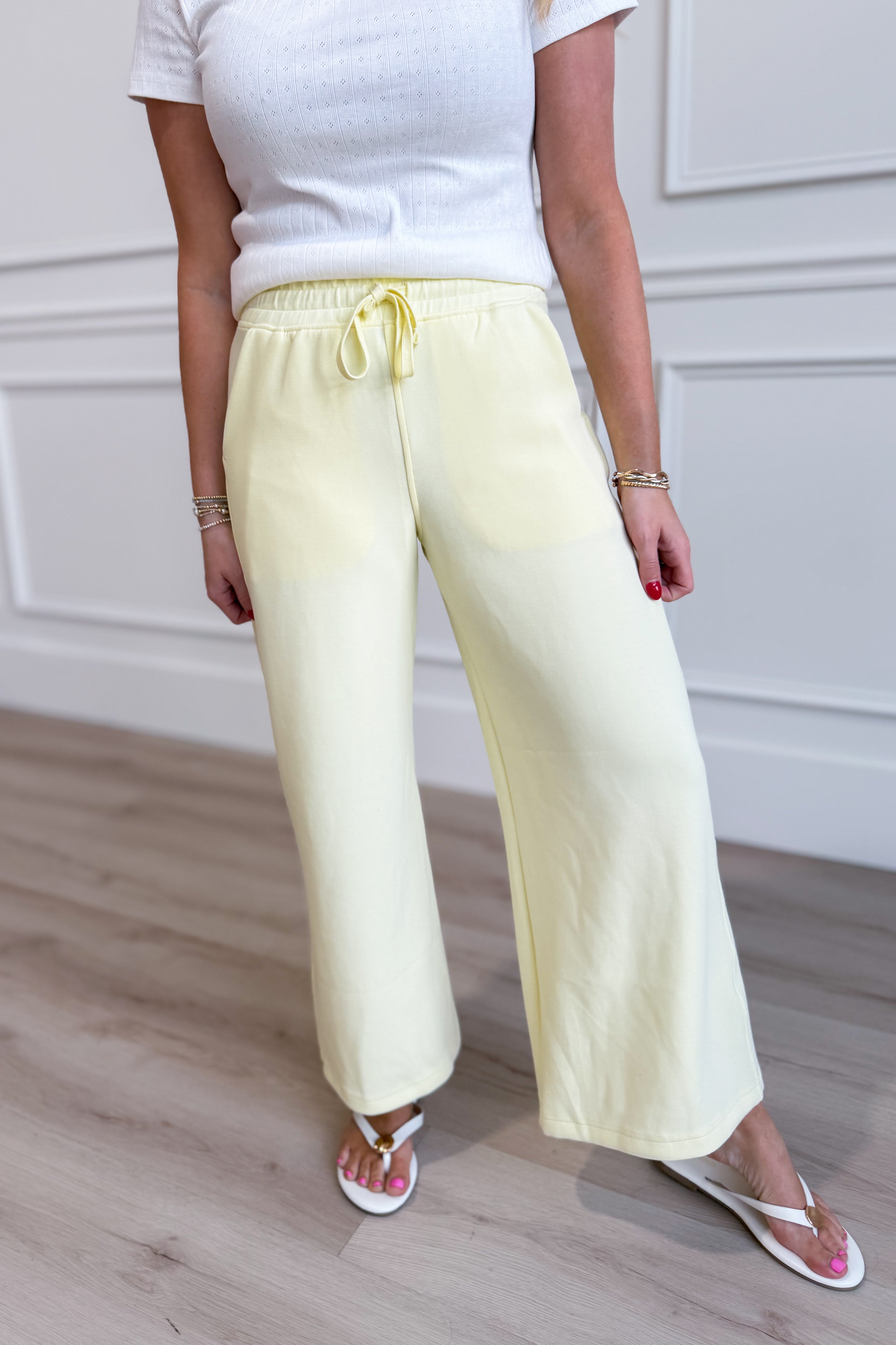 Ra e Mode Norma lemon cropped wide-leg pants, 156 pants style, shown in bright lemon fabric with a relaxed fit and cropped length.