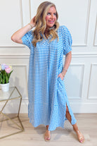 UMGEE USA Tonya plaid printed midi dress with long sleeves and a fitted waist, showcased on a model against a neutral background.