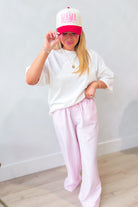 Cody off white solid basic relaxed casual top by PEACH LOVE, featuring a comfortable fit and simple design.