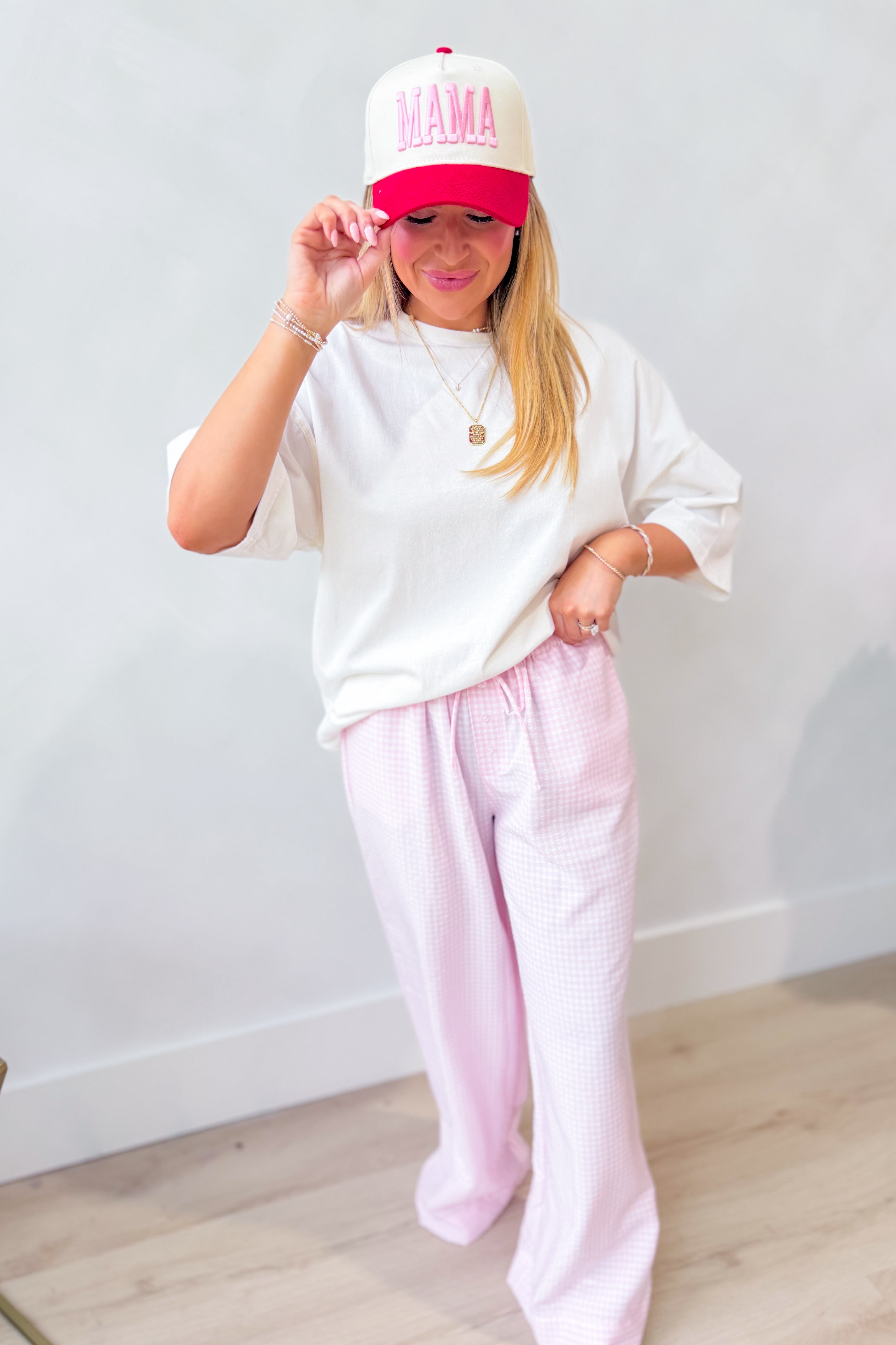 Cody off white solid basic relaxed casual top by PEACH LOVE, featuring a comfortable fit and simple design.