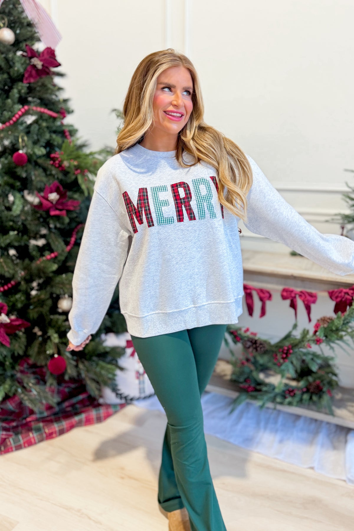 Everleigh Merry multi-colored graphic sweatshirt by TWENTIFOURTH, featuring vibrant designs on a cozy pullover.
