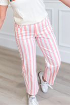 Pink and white striped barrel jeans from POPPY & PINE, featuring a relaxed fit and trendy novelty denim design.