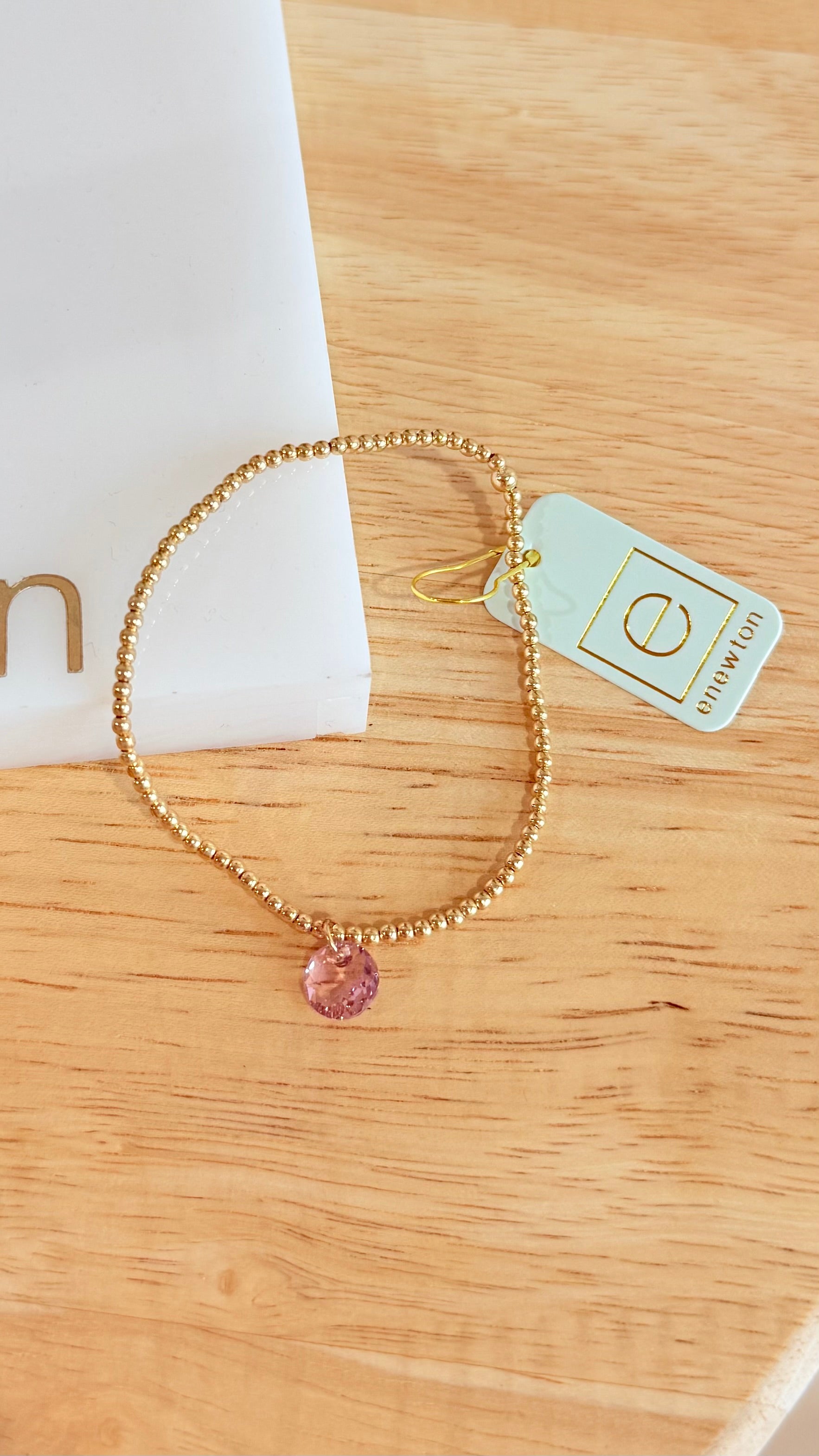 Enewton 2mm classic birthstone bracelet featuring small, colorful gemstone beads on a delicate jewelry chain.