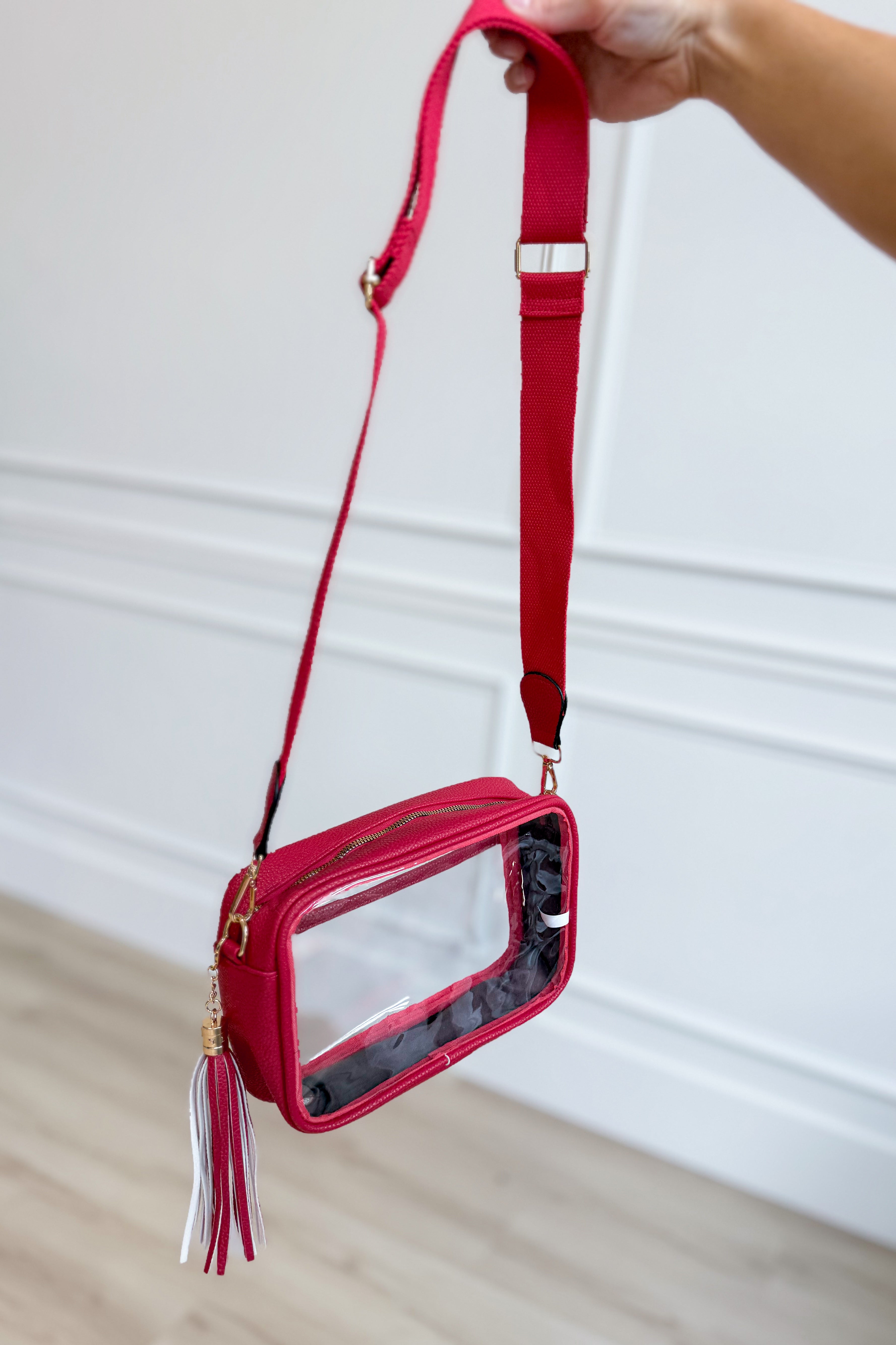 Red clear stadium crossbody bag by QUEENS DESIGNS with adjustable strap and spacious interior for everyday use.