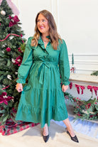 JODIFL Angela Hunter green ruffle trim tie waist dress with elegant sleeveless design and flowy fabric for dressy occasions.