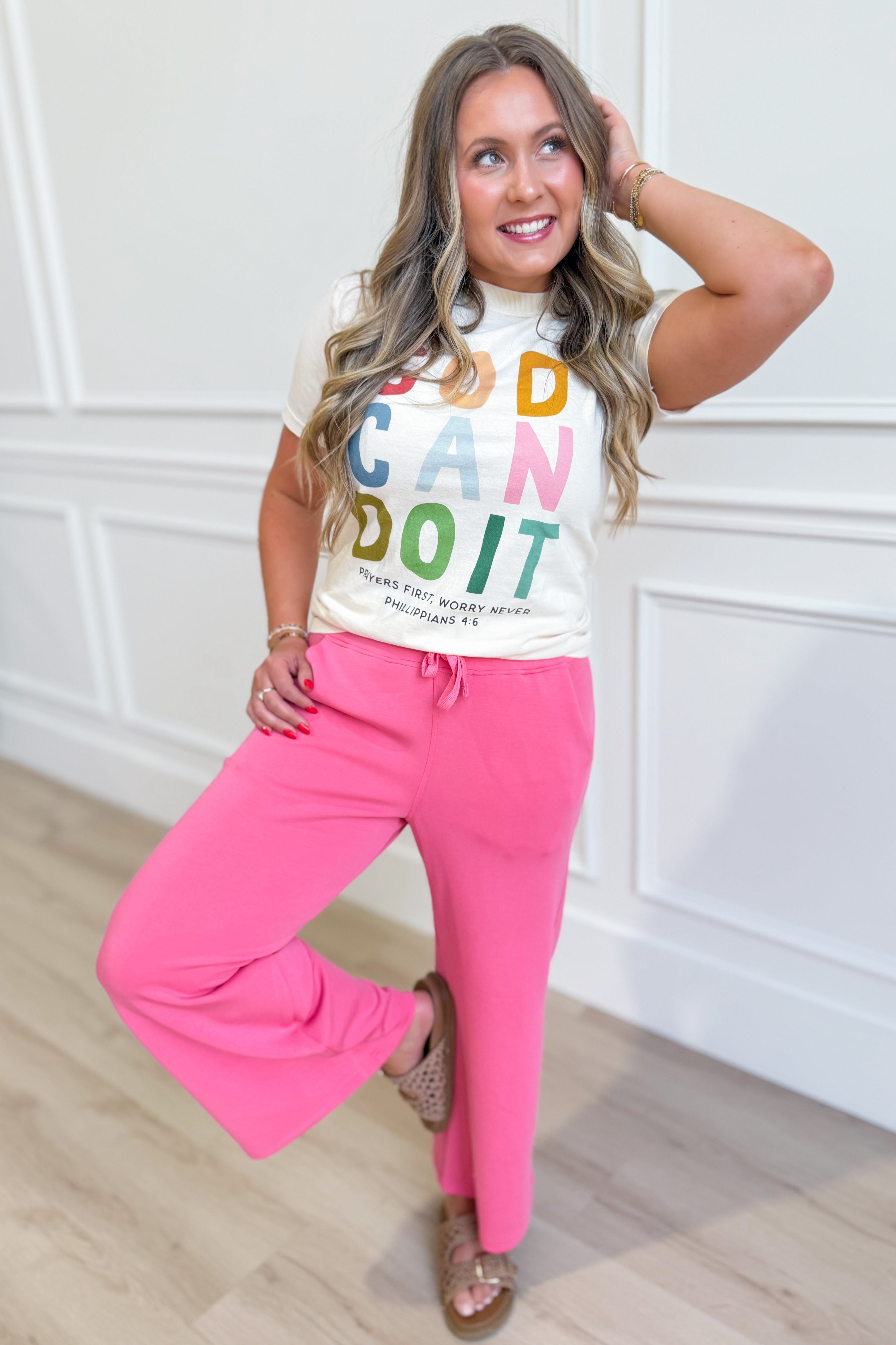 Poppy & Pine God Can Do It graphic T-shirt featuring bold text and vibrant design on a casual cotton tee.