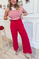 Raé Mode Norma cropped wide-leg pants, 156 pants style, showcasing the relaxed fit and stylish design in a natural pose.