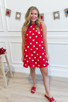 TCEC Gina polka dot print sleeveless shift dress with a casual fit, featuring a round neckline and playful black and white dots.