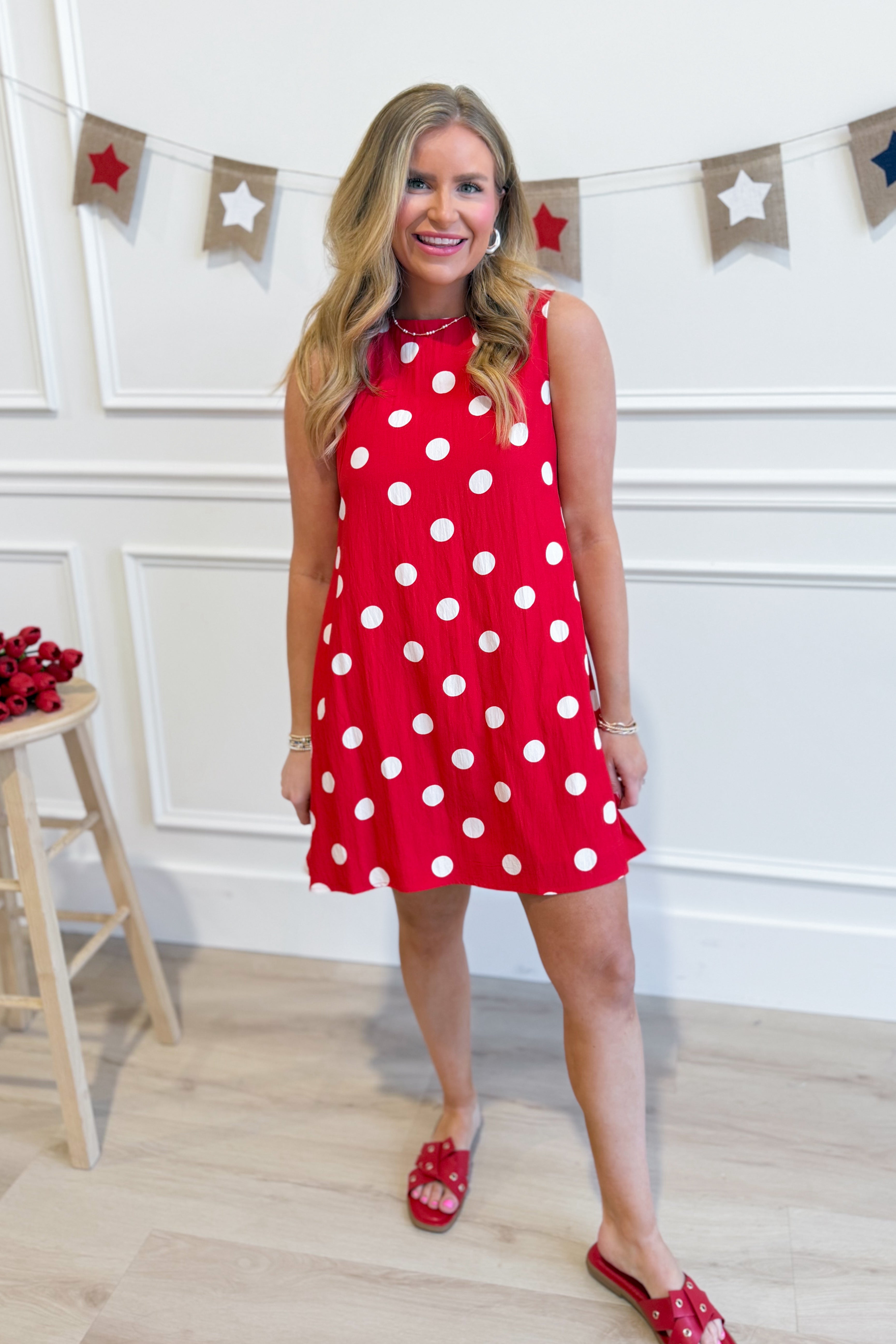 TCEC Gina polka dot print sleeveless shift dress with a casual fit, featuring a round neckline and playful black and white dots.