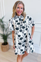 JODIFL Karen floral abstract dress with vibrant colorful patterns, elegant design, and flowy fabric suitable for dressy occasions.