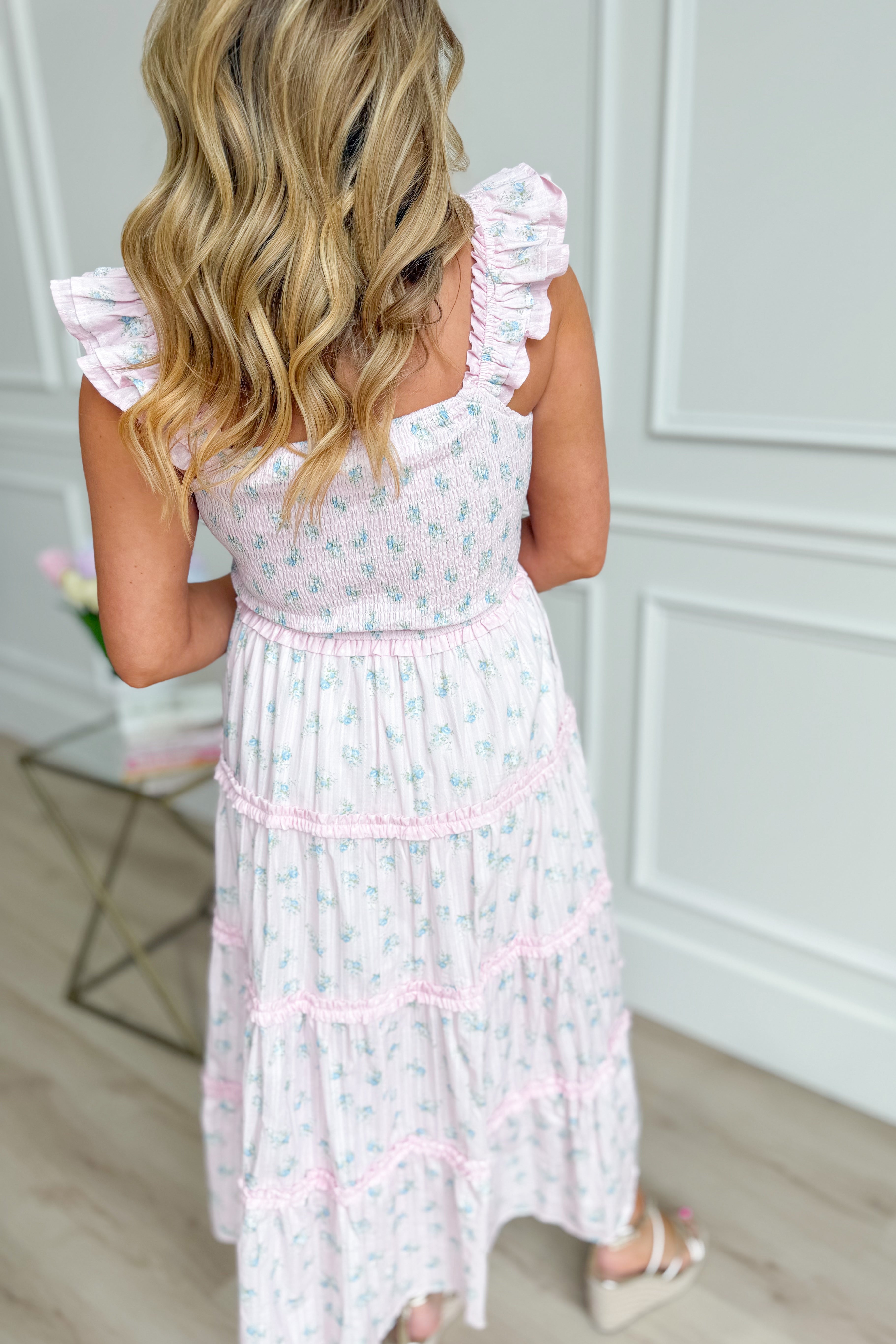 PEACH LOVE Mia Ditsy Floral Smocked Midi Dress with puff sleeves and flowy skirt, featuring a feminine floral print and smocked bodice.