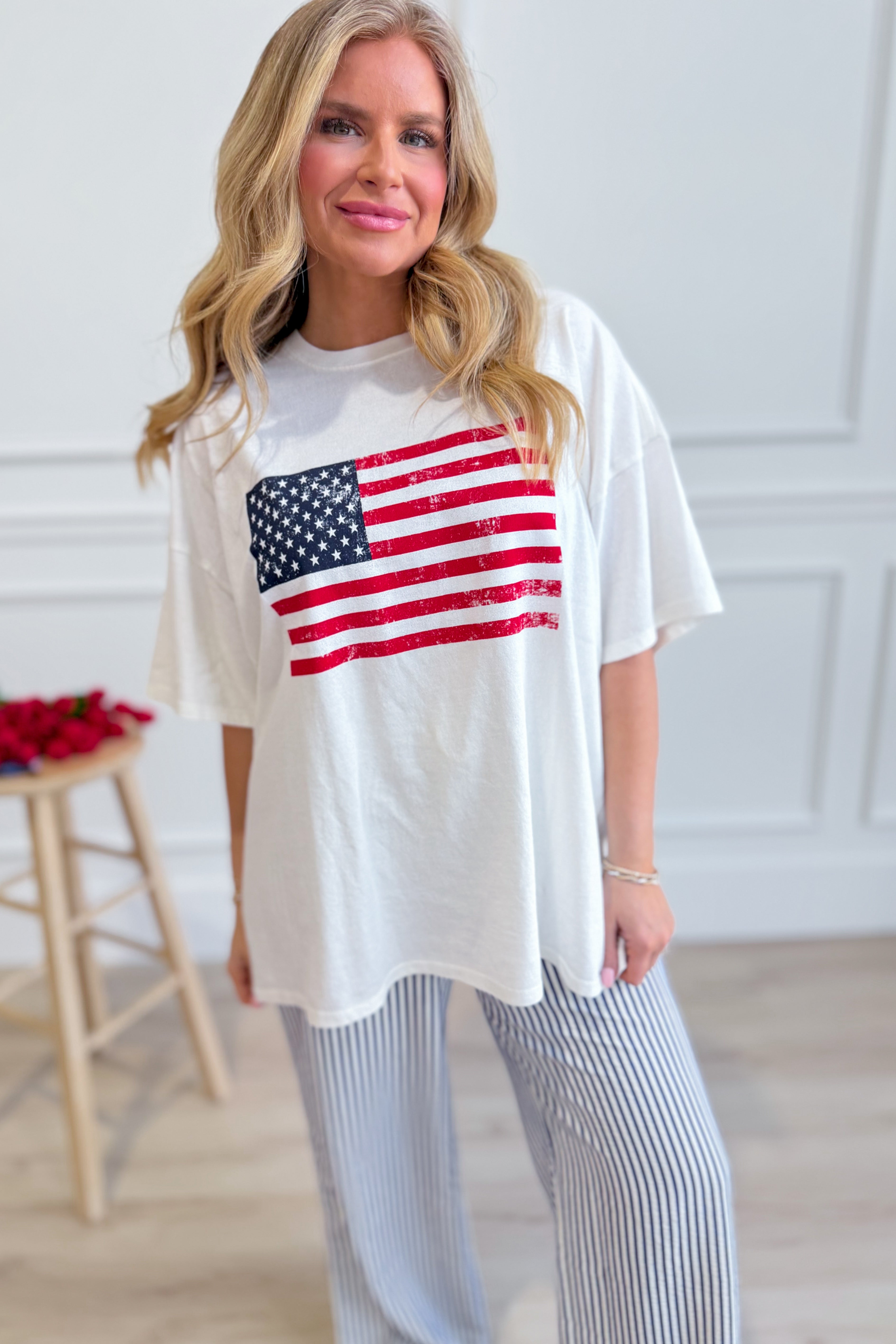 Alexander American Flag T-Shirt by HYFVE featuring a graphic design of the American flag on a casual T-shirt.