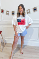 Alexander American Flag T-Shirt by HYFVE, 117 Graphic Tees, featuring a bold American flag design on a casual t-shirt.