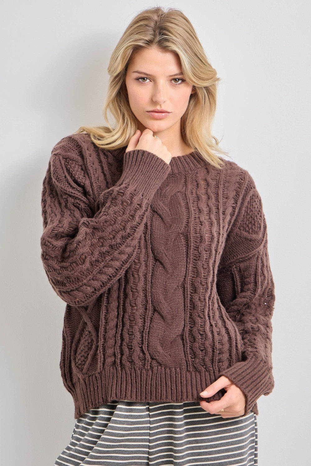 Baevely Courtney Cable Knit Sweater in a cozy fall style, featuring a textured cable knit design and a relaxed fit.