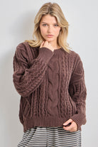 Baevely Courtney Cable Knit Sweater in a cozy fall style, featuring a textured cable knit design and a relaxed fit.