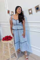 Landry floral printed peplum dress by ENTRO, elegant 125 dressy dress with vibrant floral design and flattering peplum silhouette.