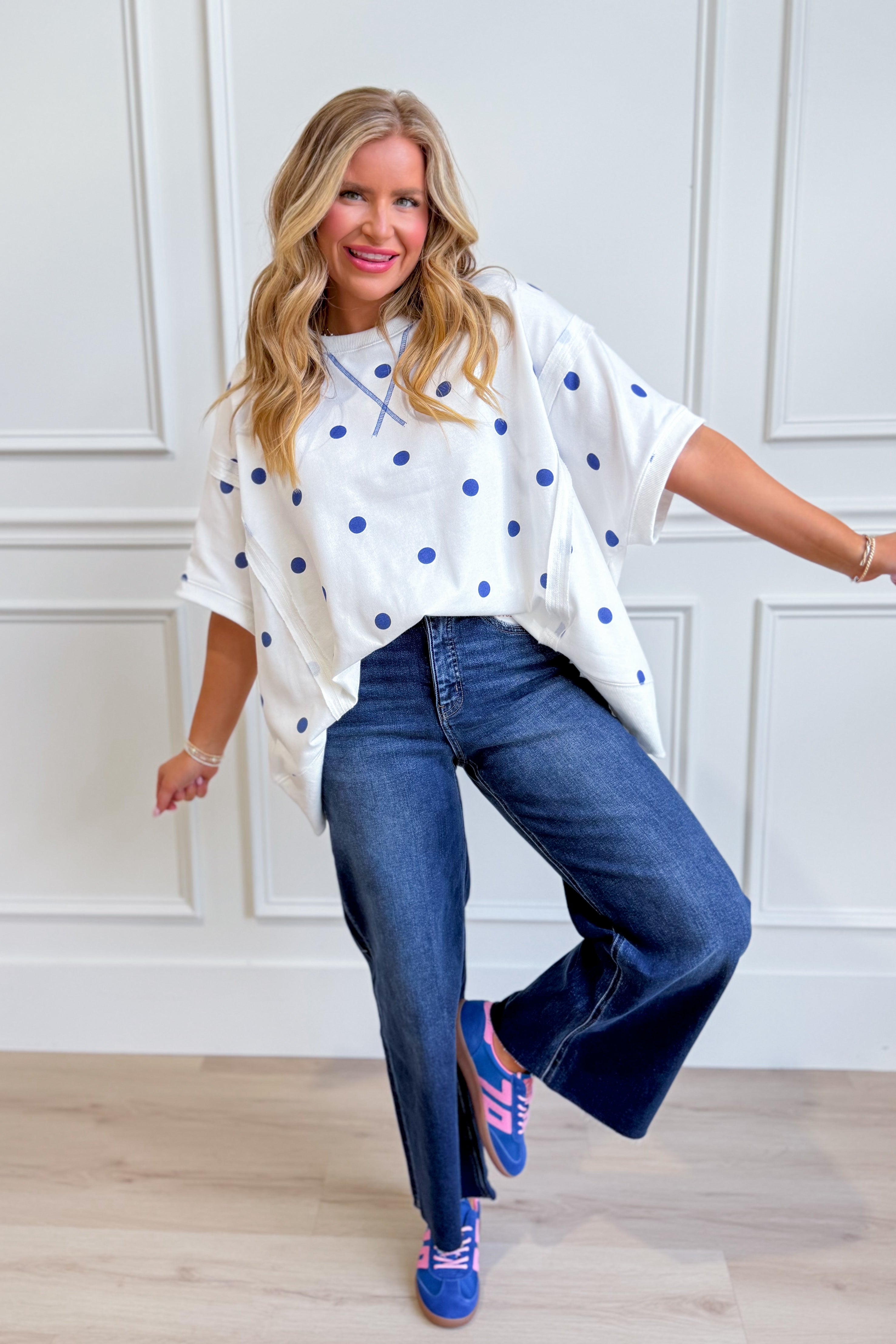 Peach Love Renee polka dot dolman sleeve casual top with relaxed fit and lightweight fabric, featuring a stylish polka dot pattern.