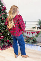 Jodifl Lucas plaid holiday top with long sleeves and a relaxed fit, perfect for festive occasions and casual wear.