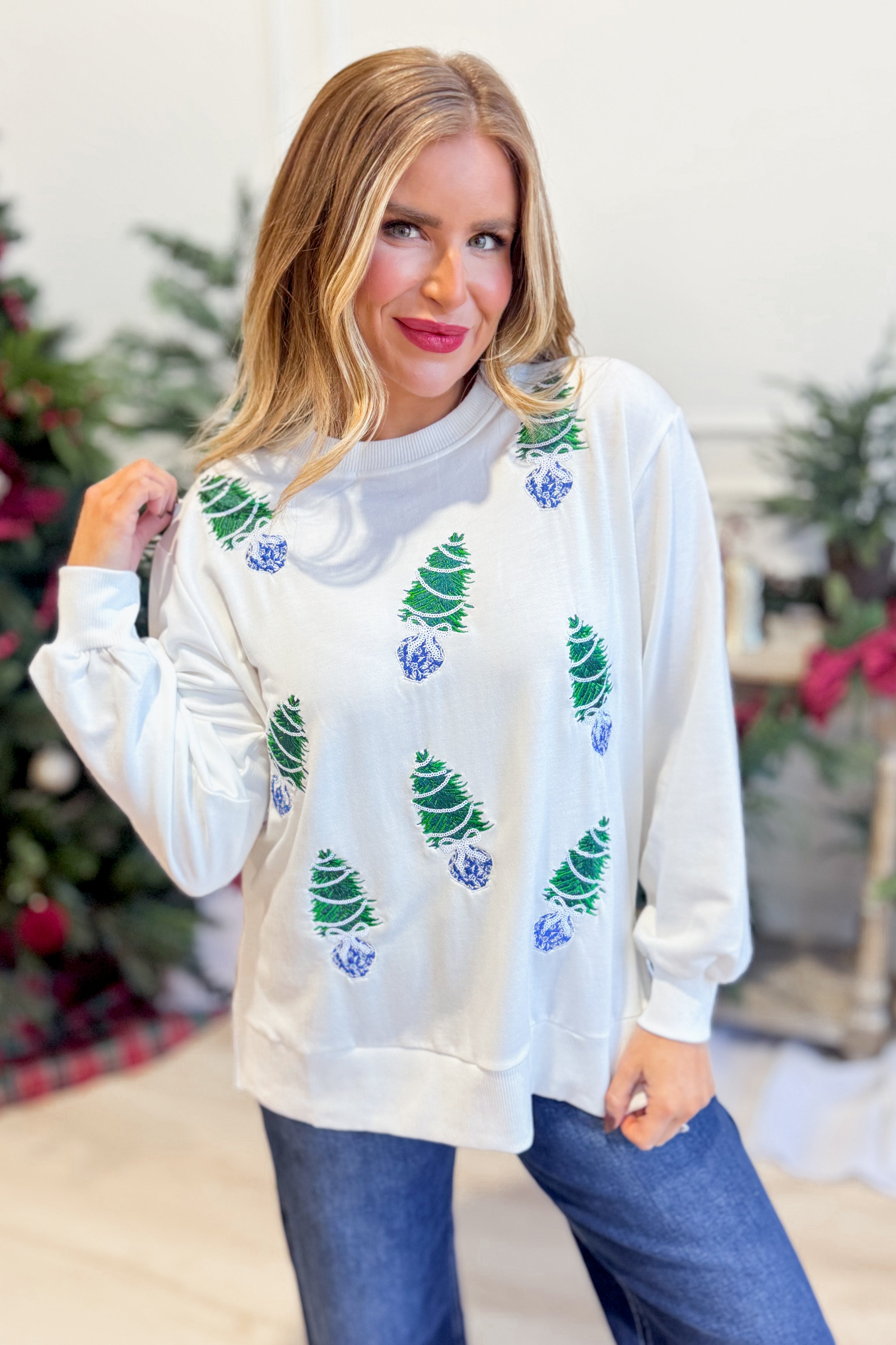 Mary Square Lakelyn sequin blue trees graphic pullover sweatshirt against a white background