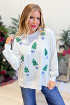Mary Square Lakelyn sequin blue trees graphic pullover sweatshirt against a white background