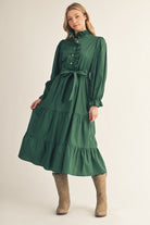 JODIFL Angela Hunter green ruffle trim tie waist dress, stylish and elegant for dressy occasions, with ruffle details and a flattering silhouette.