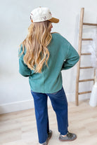 BLU PEPPER Cindy ribbed Henley long sleeve top, casual 105 top with buttoned neckline and fitted ribbed fabric, in a neutral color.