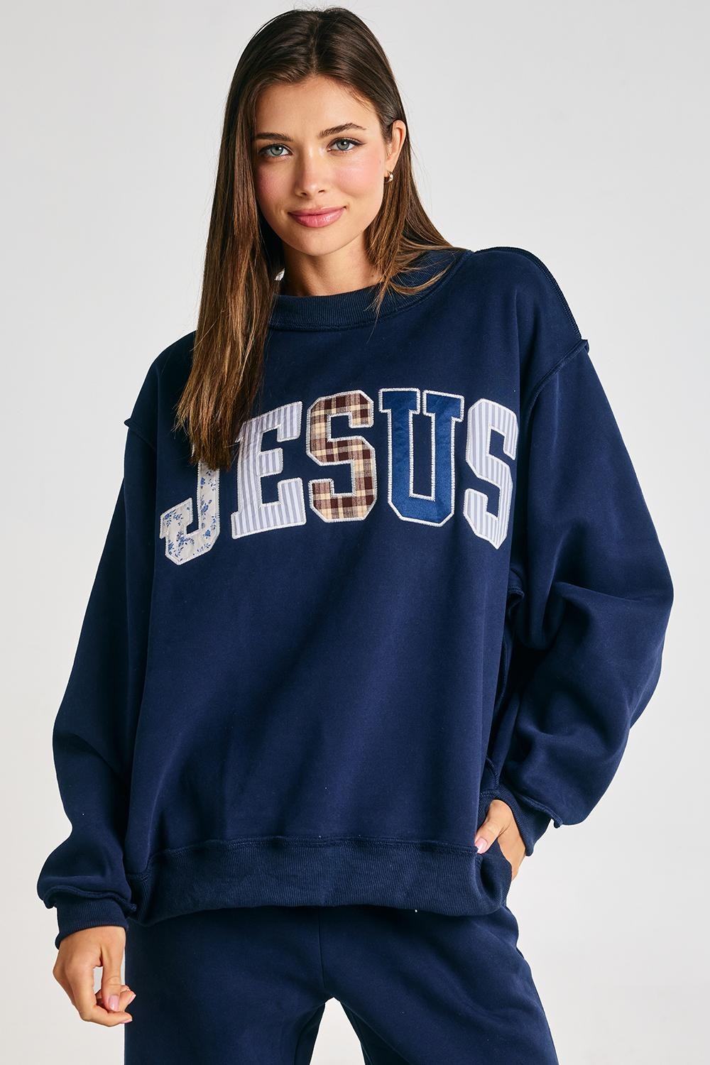 Jesus Navy mock embroidered sweatshirt from BUCKET LIST's 137 Graphic Sweatshirts collection, featuring a detailed Jesus graphic design.