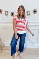 Red striped Nikki split neck top from STACCATO's 131 Spring Sweaters collection, featuring a stylish split neckline and vibrant pattern.