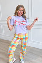 Pink crop tee with "Be Kind To Your Mom" graphic from POPPY & PINE's 117 Graphic Tees collection, casual and stylish for women.